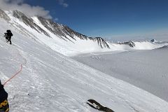 
Branscomb Peak And Prncipe de Asturias Peak With Mount Vinson Low Camp Below On Branscomb Glacier From Rest Stop In The Rock Band On The Climb Up The Fixed Ropes To High Camp
